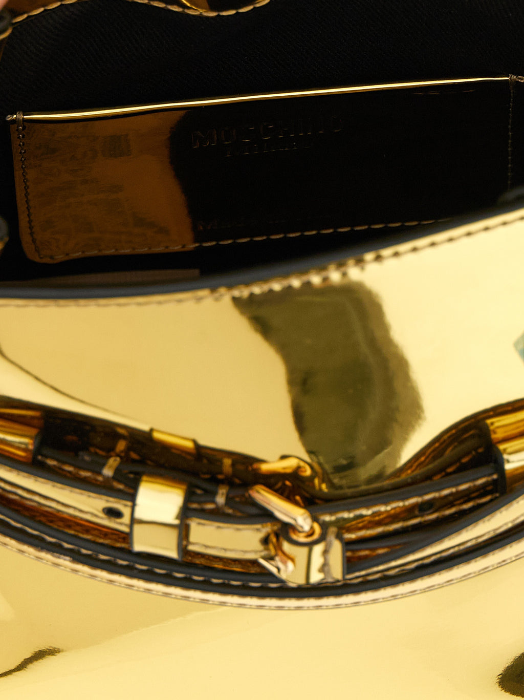 Moschino Goldene Polyethylen-Handtasche
