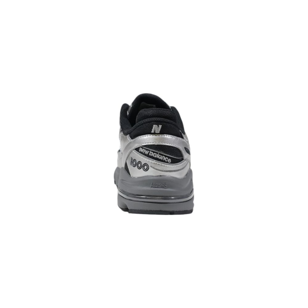 New Balance Silberne synthetische Sportsneakers